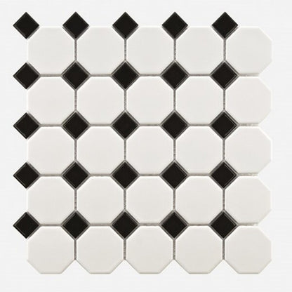 A black and white mosaic tile with a geometric pattern consisting of diamonds and squares used in bathroom or kitchen