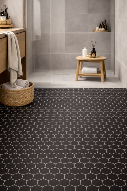 medium black hexagon mosaics on bathroom floor
